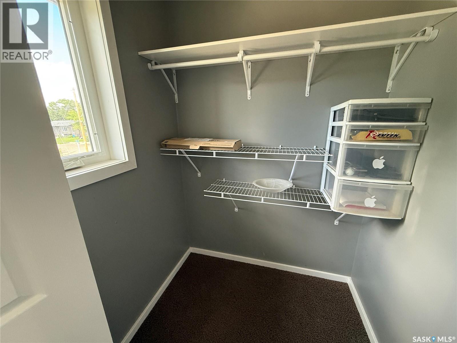 802 Park Avenue, Weyburn, SK - Indoor With Storage