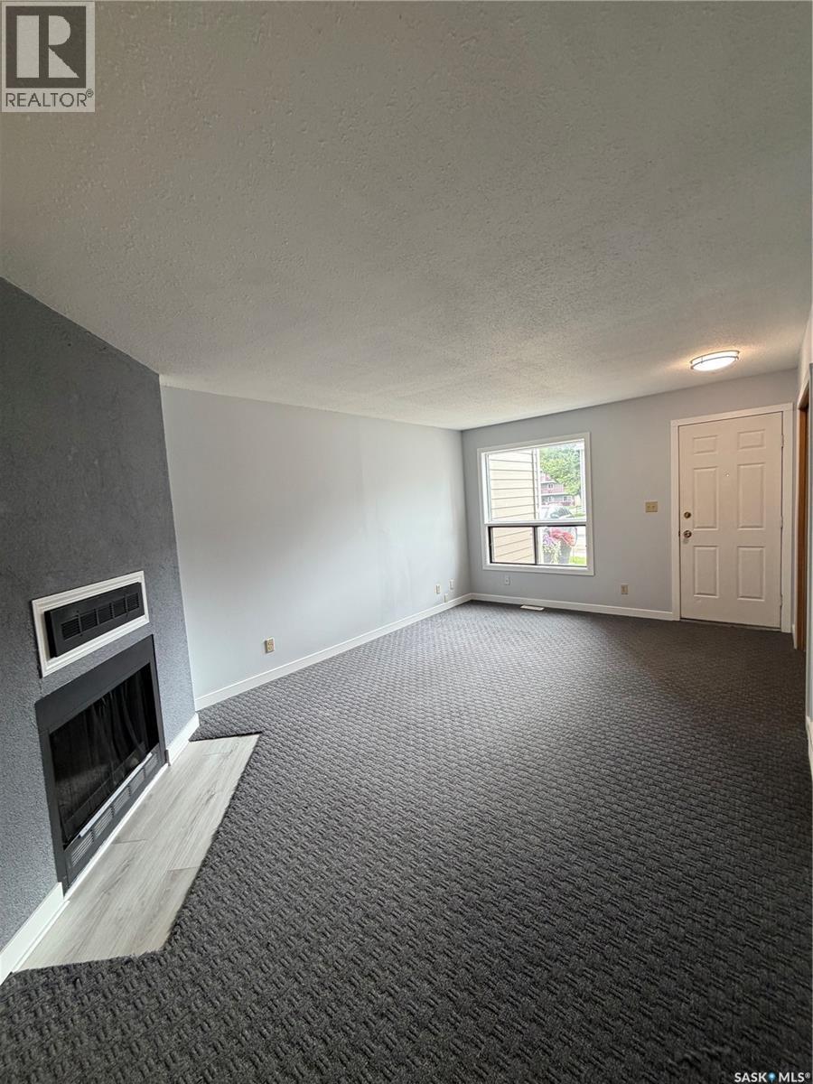 376 Cedar Meadow Drive, Regina, SK - Indoor With Fireplace