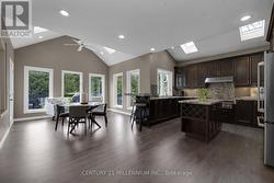 Kitchen features centre islandand backsplash - 