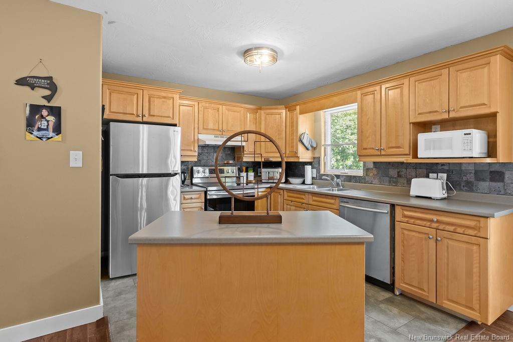 69-71 Hemmer Jane Dr, Moncton, NB - Indoor Photo Showing Kitchen With Double Sink