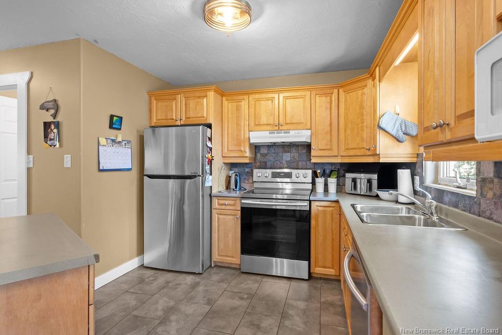 69-71 Hemmer Jane Dr, Moncton, NB - Indoor Photo Showing Kitchen With Double Sink
