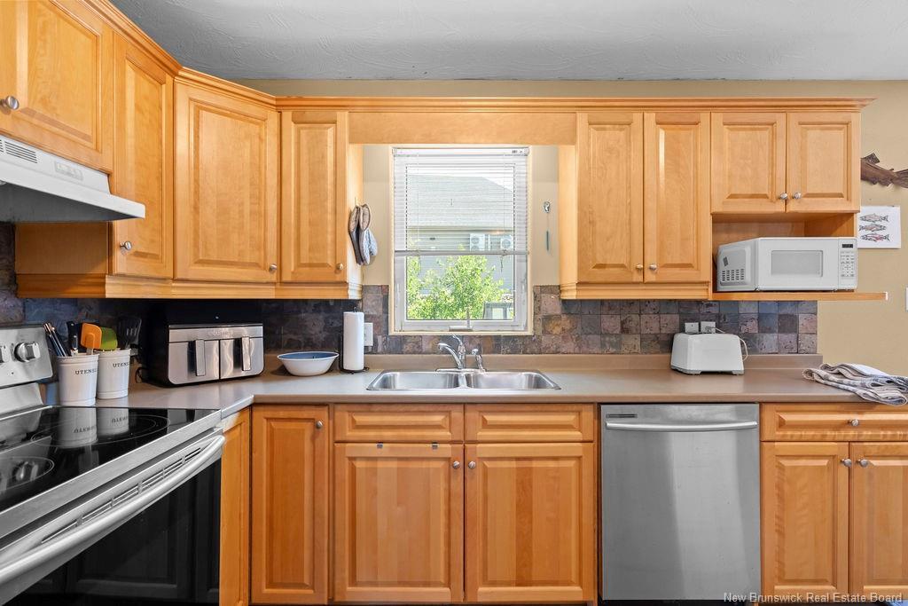 69-71 Hemmer Jane Dr, Moncton, NB - Indoor Photo Showing Kitchen With Double Sink