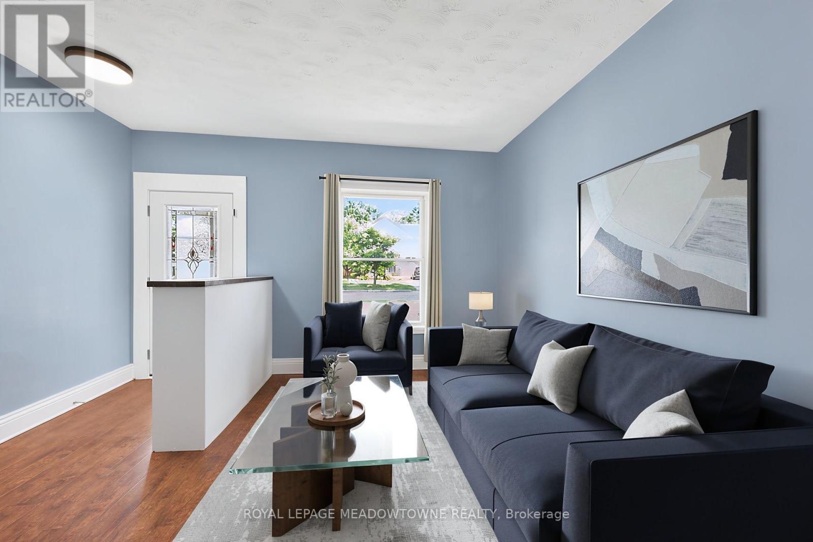 digitally staged with different furniture styles - 11 Stirton Avenue, Brantford, ON - Indoor Photo Showing Living Room
