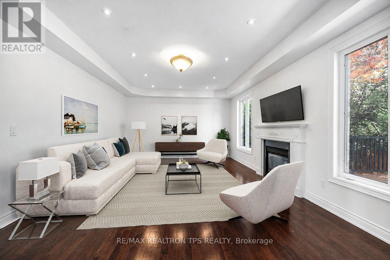 Potlights - 555 Kingsfield Loop, Oshawa, ON - Indoor Photo Showing Living Room With Fireplace