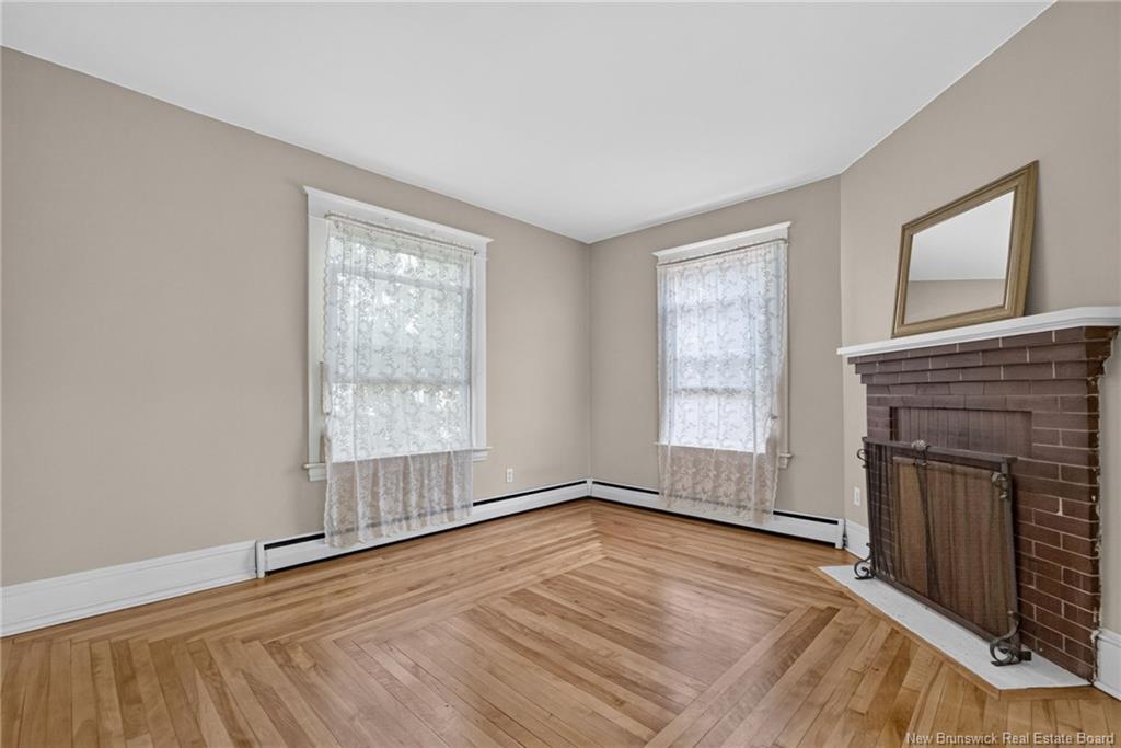 298-300 Cameron St, Moncton, NB - Indoor Photo Showing Other Room With Fireplace