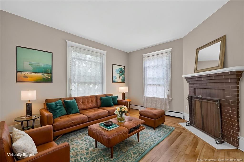 298-300 Cameron St, Moncton, NB - Indoor Photo Showing Living Room With Fireplace