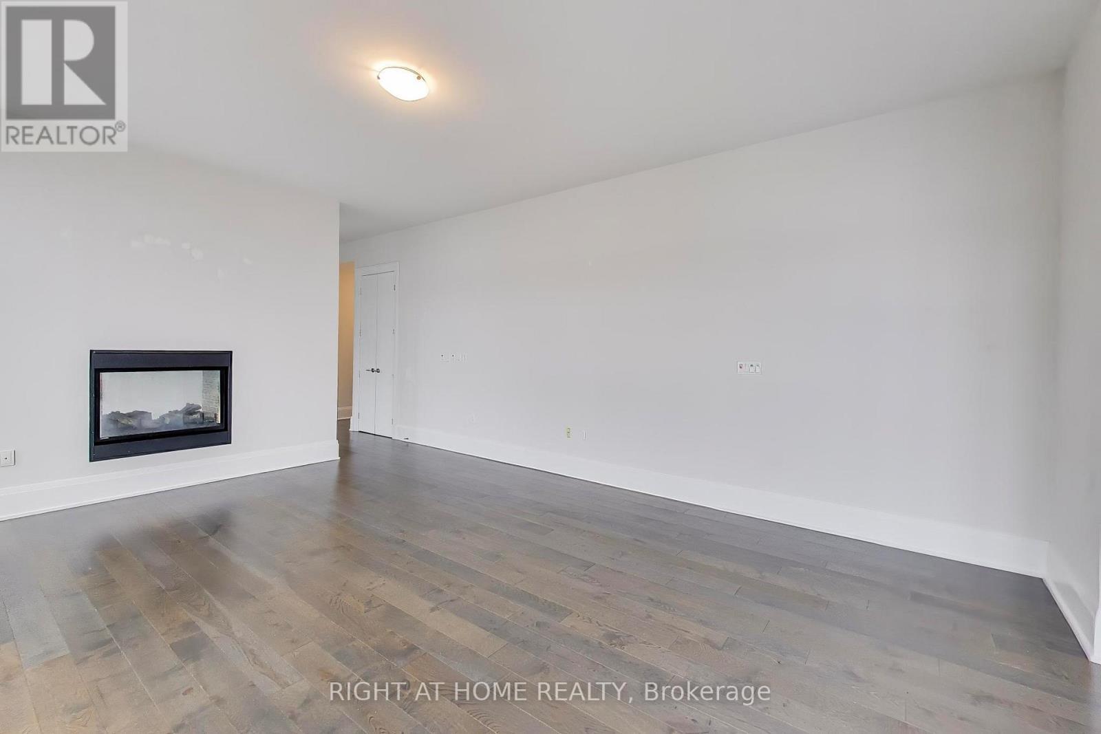 1126 - 39 Queens Quay E, Toronto, ON - Indoor Photo Showing Other Room With Fireplace
