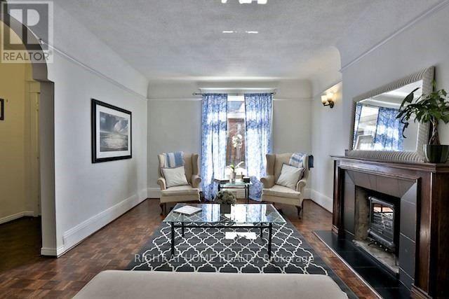 1st Floor unit - 34 Macpherson Avenue, Toronto, ON - Indoor Photo Showing Living Room With Fireplace