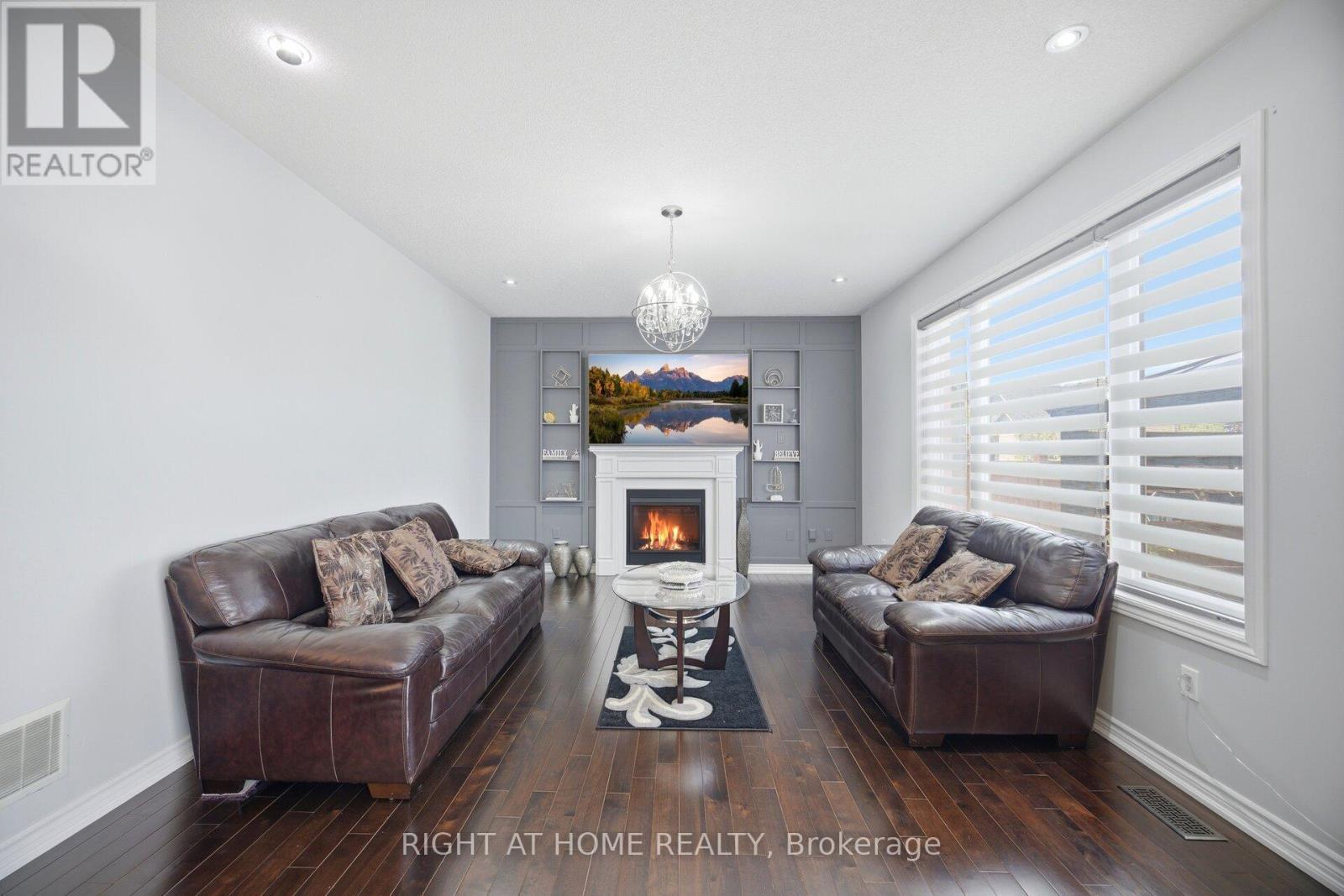 28 Marks Road, Springwater, ON - Indoor Photo Showing Living Room With Fireplace