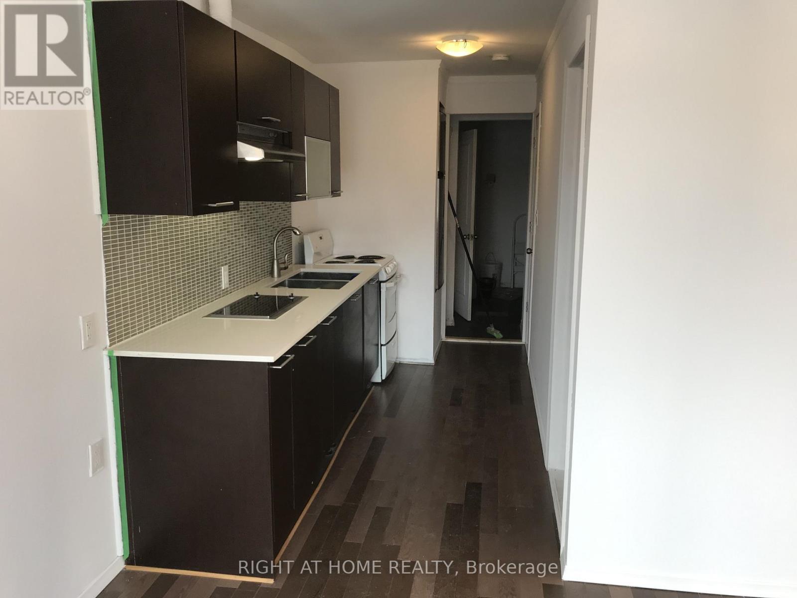 104 Danforth Road, Toronto, ON - Indoor Photo Showing Kitchen With Double Sink