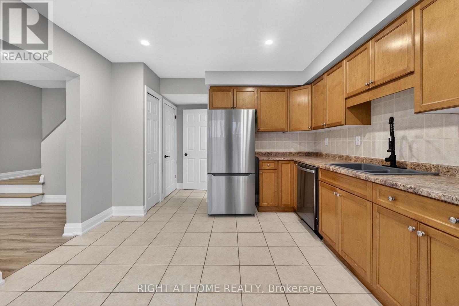 65 Woodman Drive S, Hamilton, ON - Indoor Photo Showing Kitchen With Double Sink