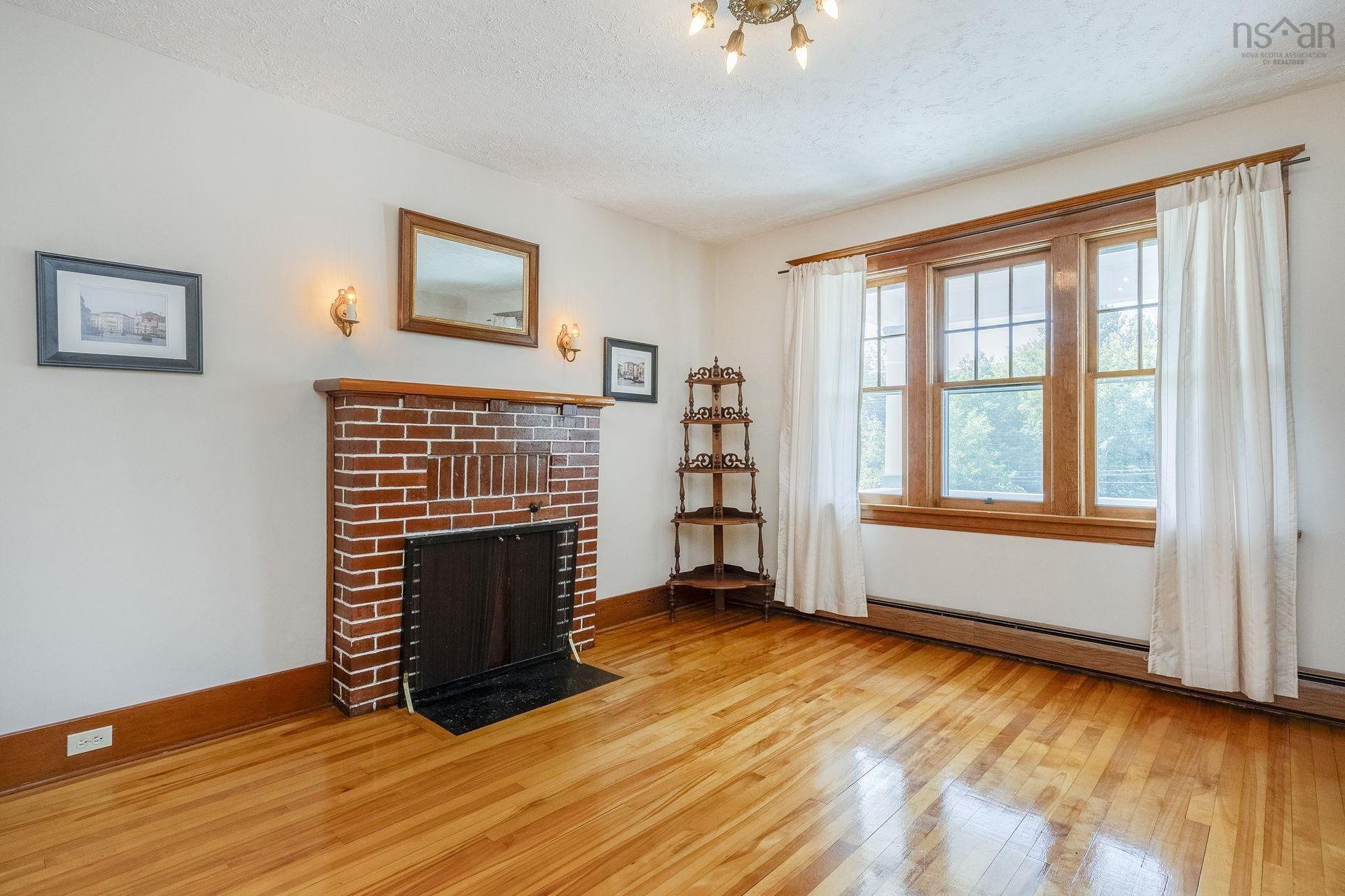 603 Sutherland Terrace, Kentville, NS - Indoor Photo Showing Other Room With Fireplace