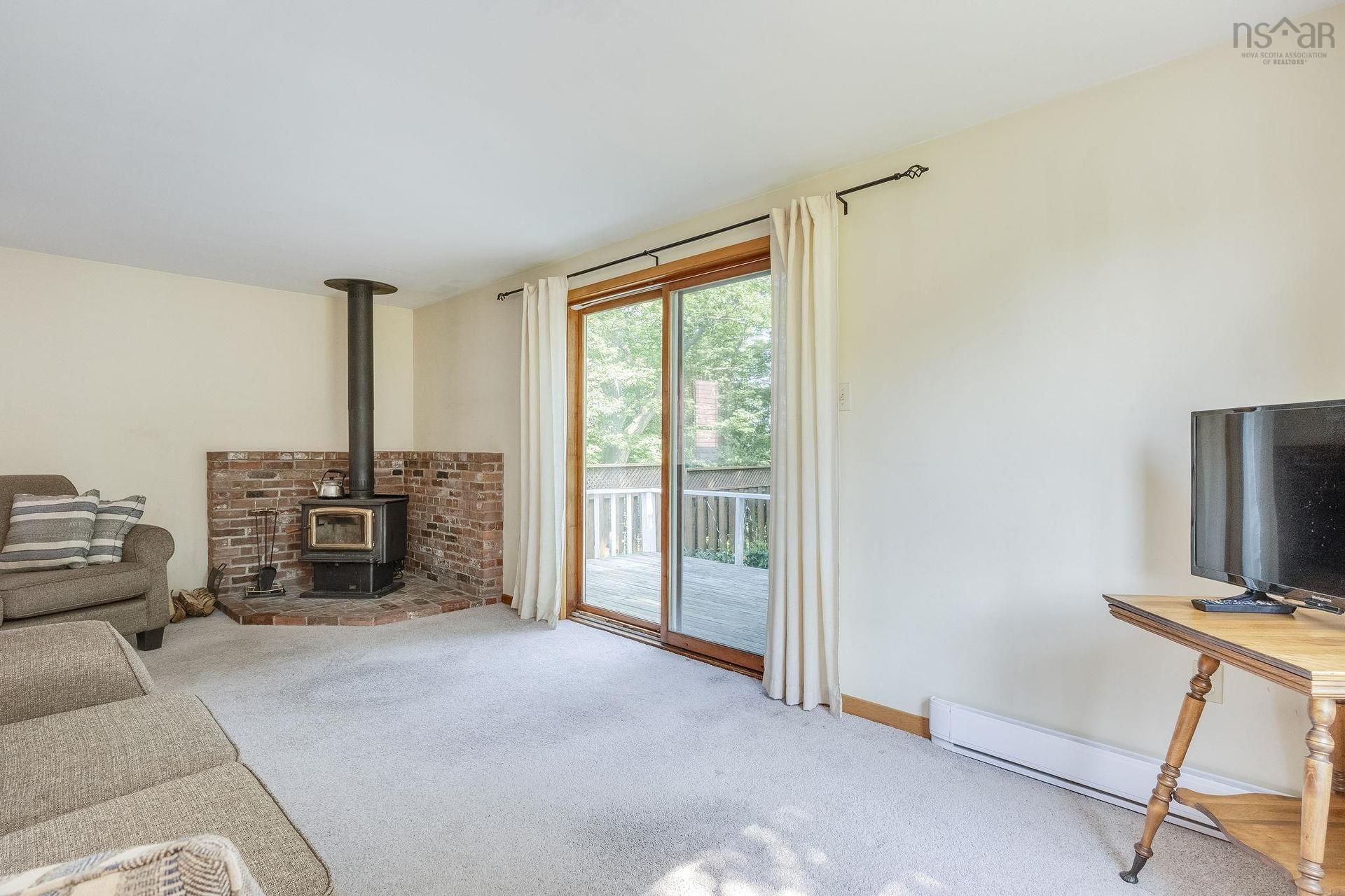603 Sutherland Terrace, Kentville, NS - Indoor Photo Showing Other Room With Fireplace