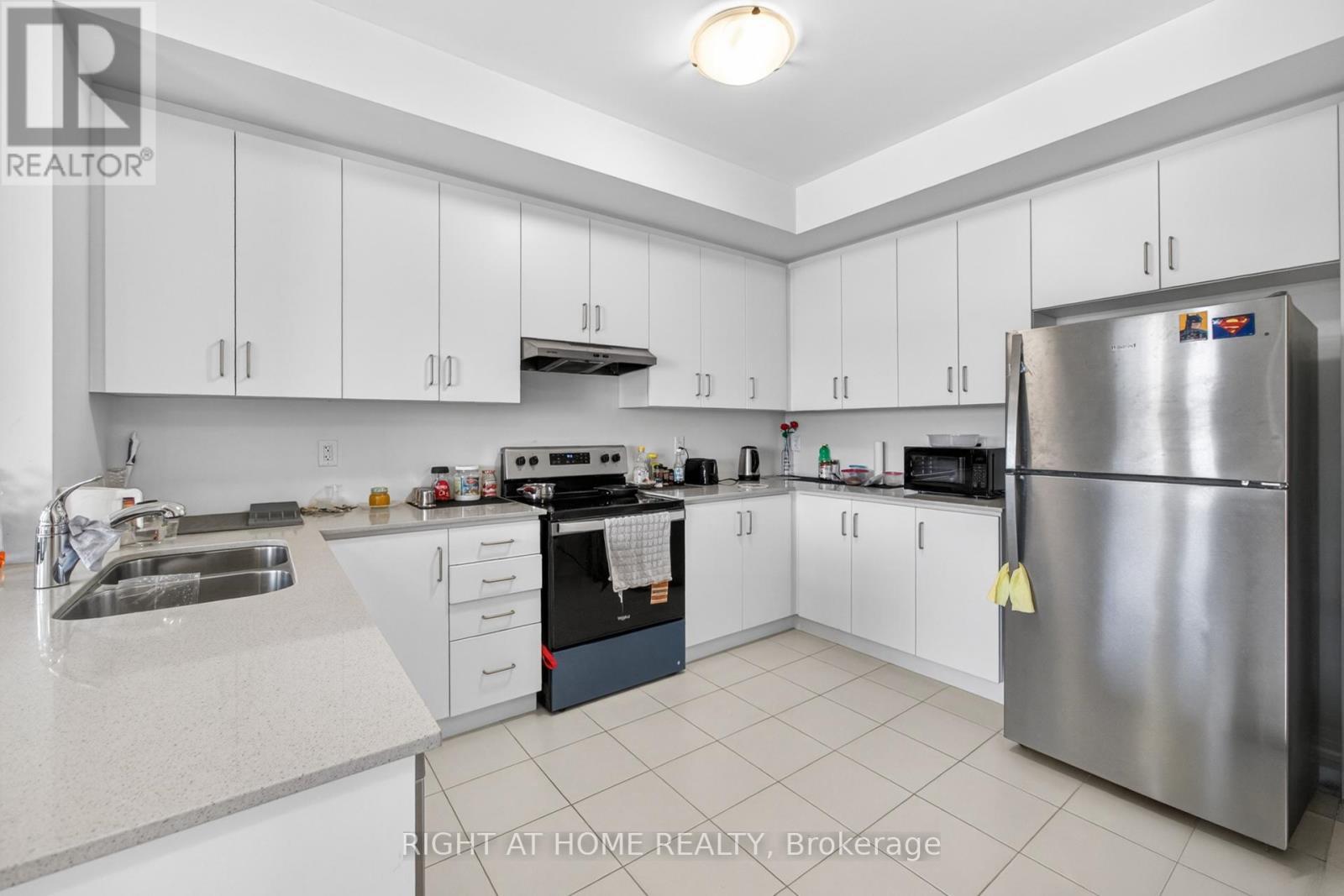 24 Monreau Drive, Brampton, ON - Indoor Photo Showing Kitchen With Double Sink