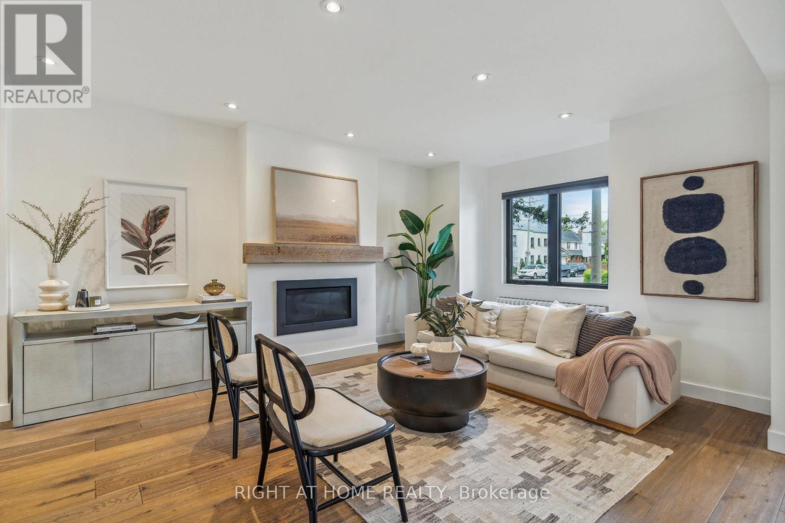 141 O'Connor Drive, Toronto, ON - Indoor Photo Showing Living Room With Fireplace