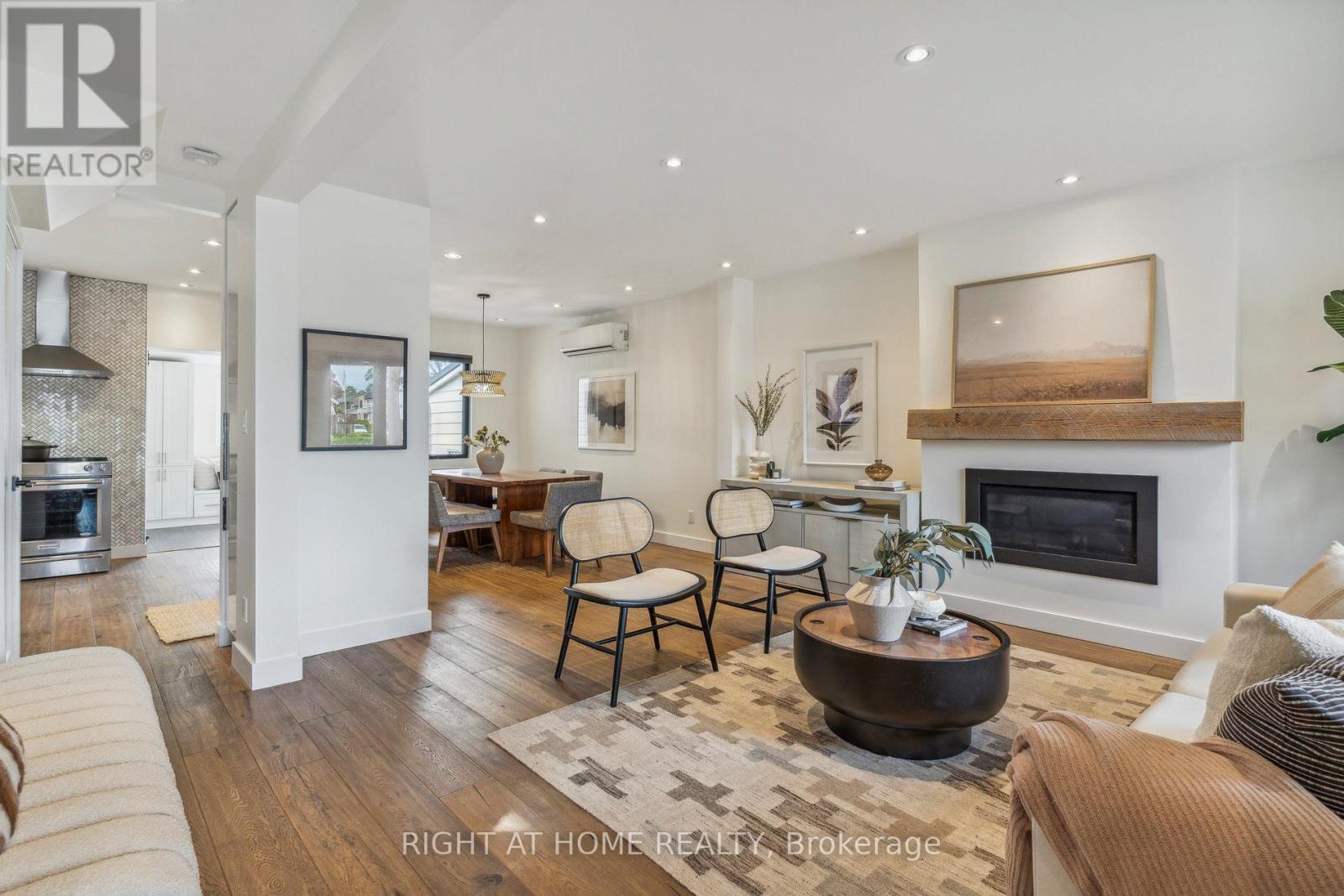 141 O'Connor Drive, Toronto, ON - Indoor Photo Showing Living Room With Fireplace