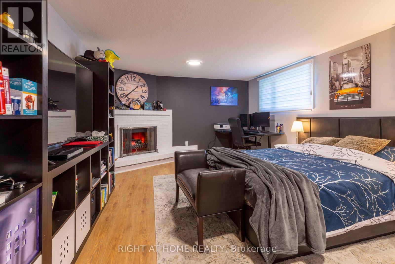 212 Lockhart Drive, St. Catharines, ON - Indoor Photo Showing Bedroom With Fireplace