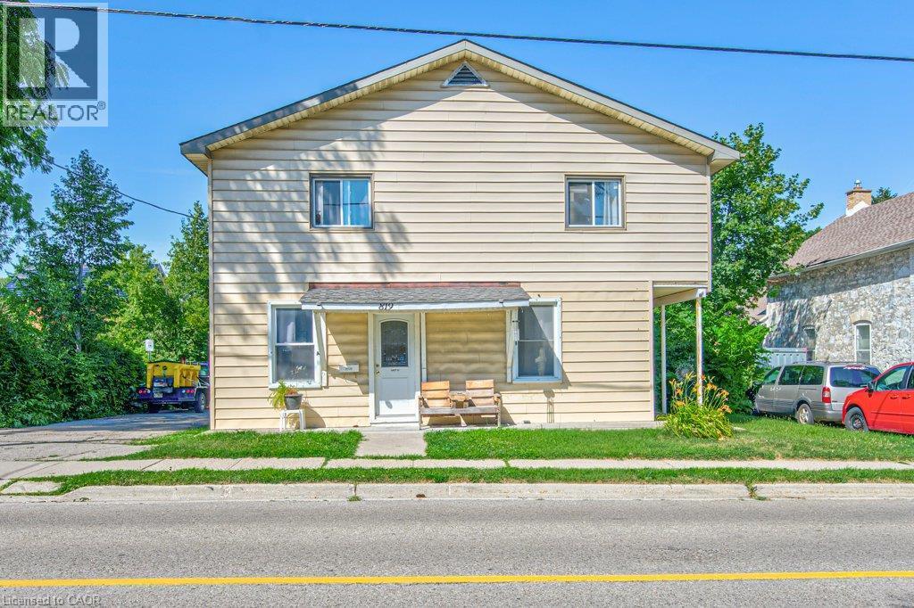 Two-story property featuring light-colored horizontal siding and a central entrance - 819 Duke Street, Cambridge, ON - Outdoor