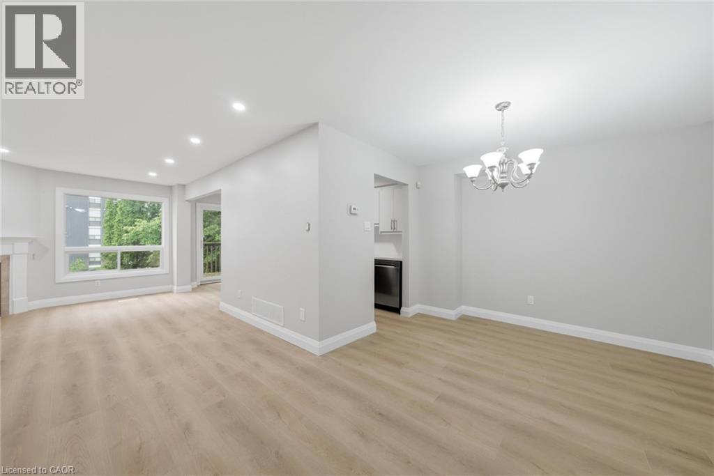 2155 Duncaster Drive Unit# 2, Burlington, ON - Indoor With Fireplace