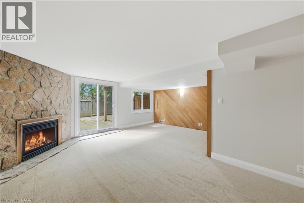 2155 Duncaster Drive Unit# 2, Burlington, ON - Indoor With Fireplace