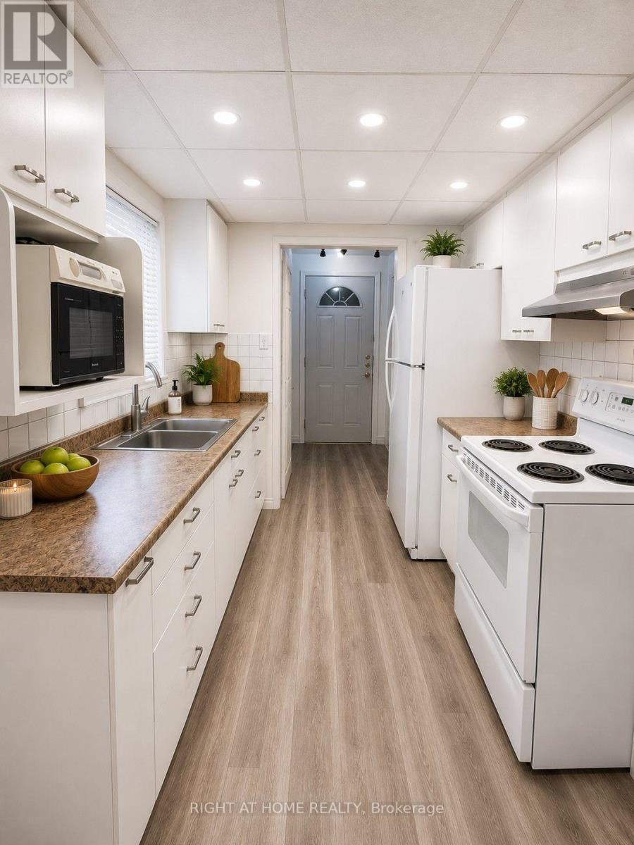 virtually staged - 96 Markwood Drive, Kitchener, ON - Indoor Photo Showing Kitchen With Double Sink