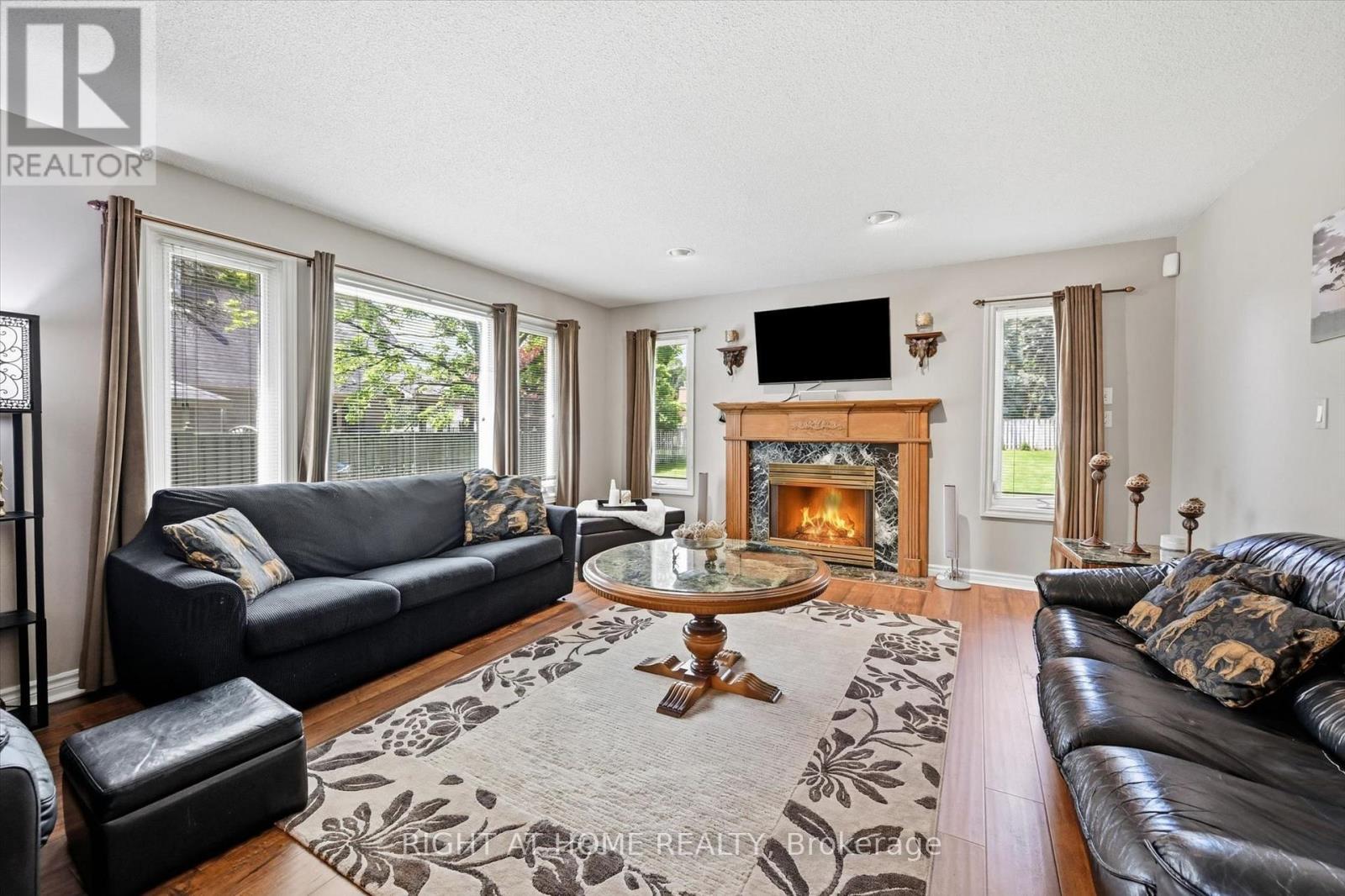 1 Idared Road, Hamilton, ON - Indoor Photo Showing Living Room With Fireplace