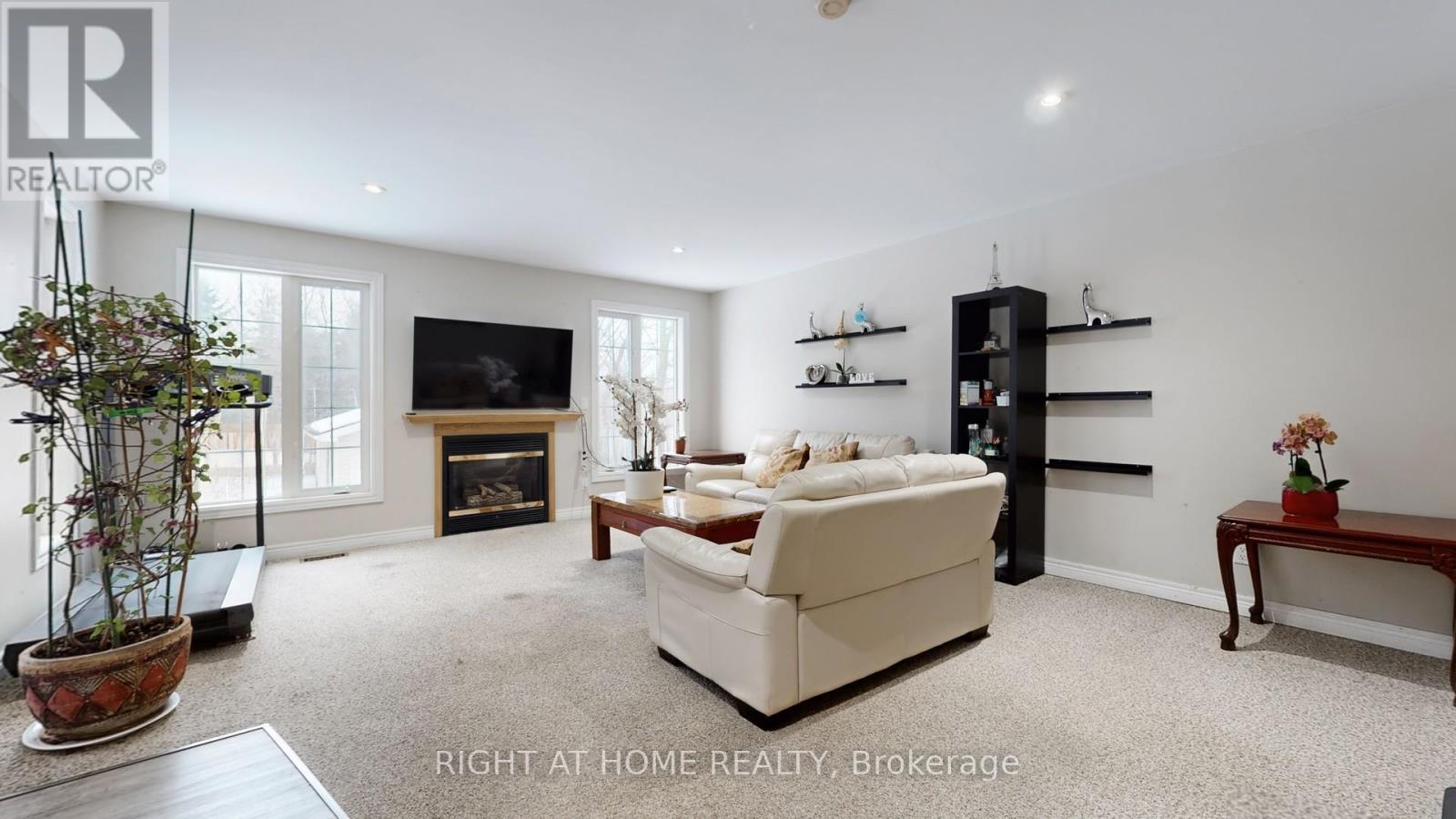 301 Garner Road E, Hamilton, ON - Indoor Photo Showing Living Room With Fireplace
