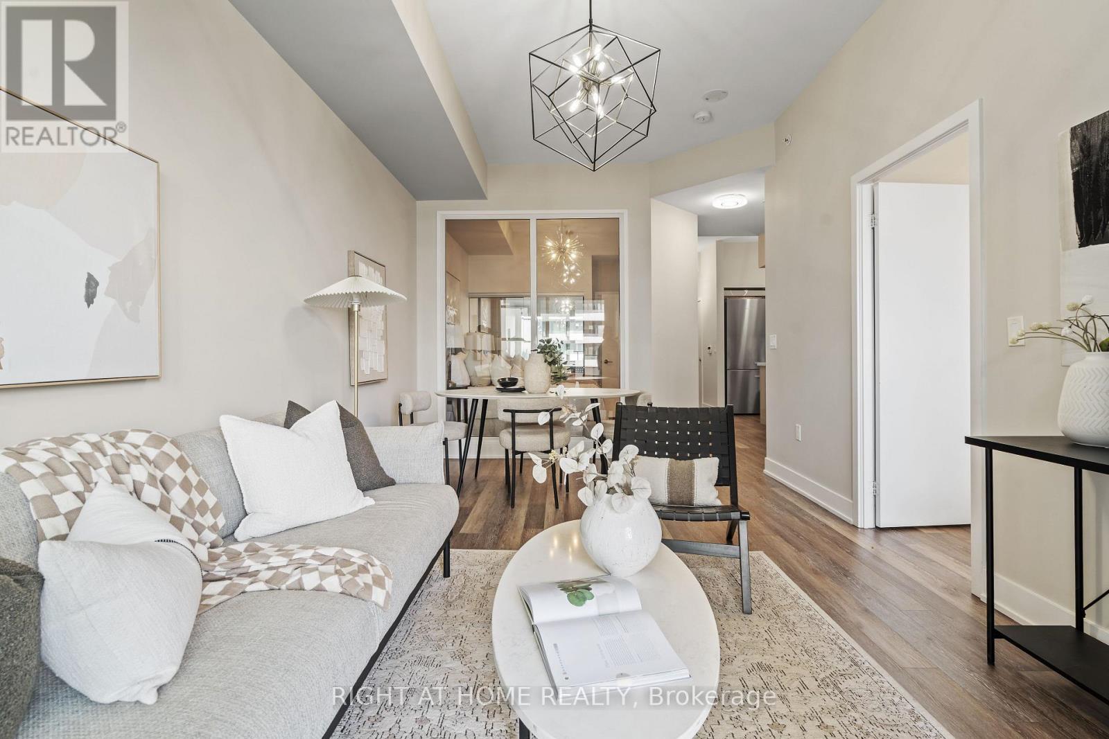 329 - 30 Shore Breeze Drive, Toronto, ON - Indoor Photo Showing Living Room