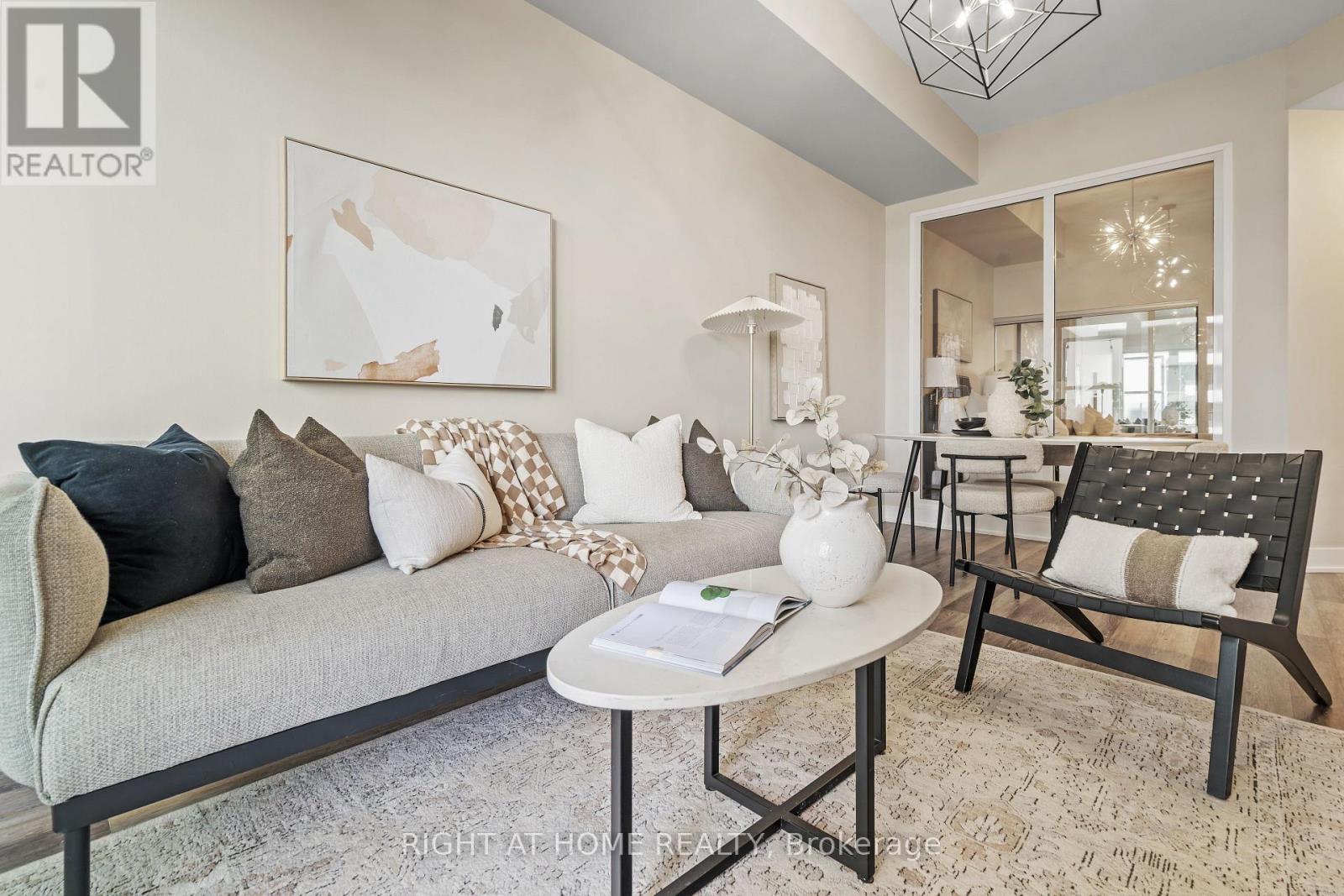 329 - 30 Shore Breeze Drive, Toronto, ON - Indoor Photo Showing Living Room