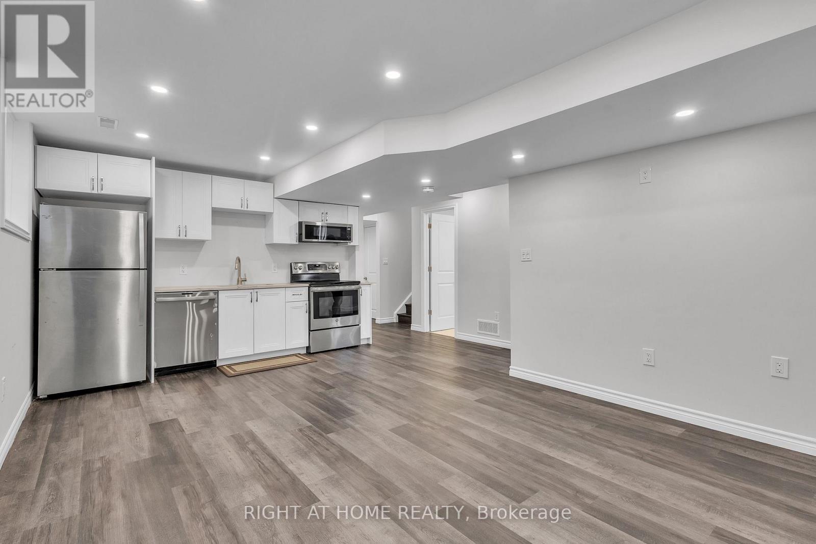 Basement Living/Dining - 321 Carriage Way, Waterloo, ON - Indoor Photo Showing Kitchen With Stainless Steel Kitchen