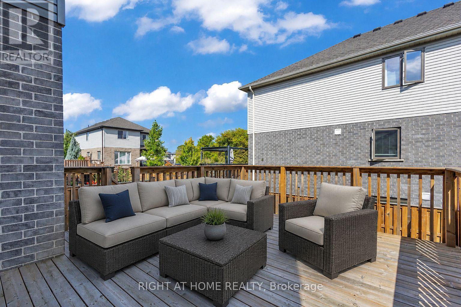 First floor walkout deck(Virtually Staged Photo) - 321 Carriage Way, Waterloo, ON - Outdoor With Deck Patio Veranda With Exterior