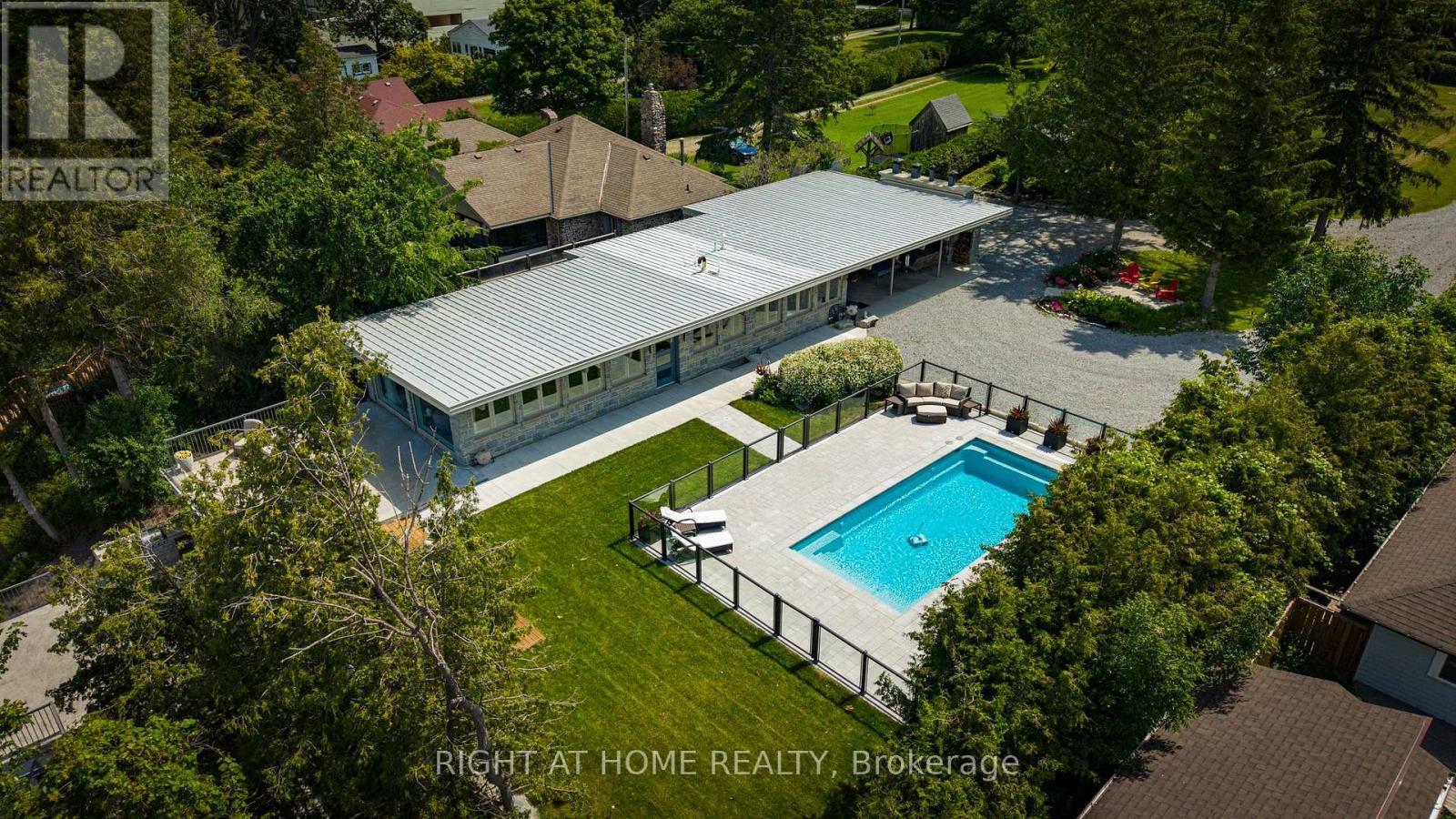 25260 Maple Beach Road, Brock, ON - Outdoor With In Ground Pool With Deck Patio Veranda