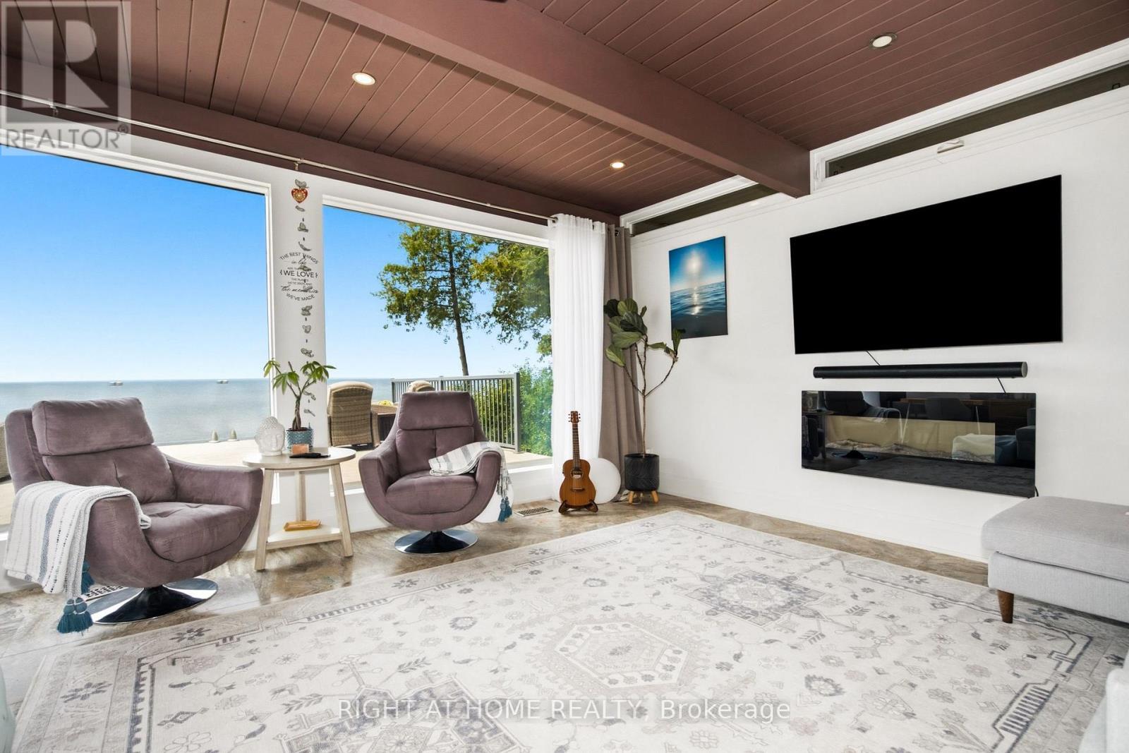 25260 Maple Beach Road, Brock, ON - Indoor Photo Showing Living Room With Fireplace