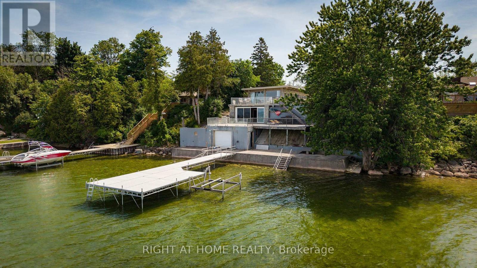 25260 Maple Beach Road, Brock, ON - Outdoor With Body Of Water With Deck Patio Veranda