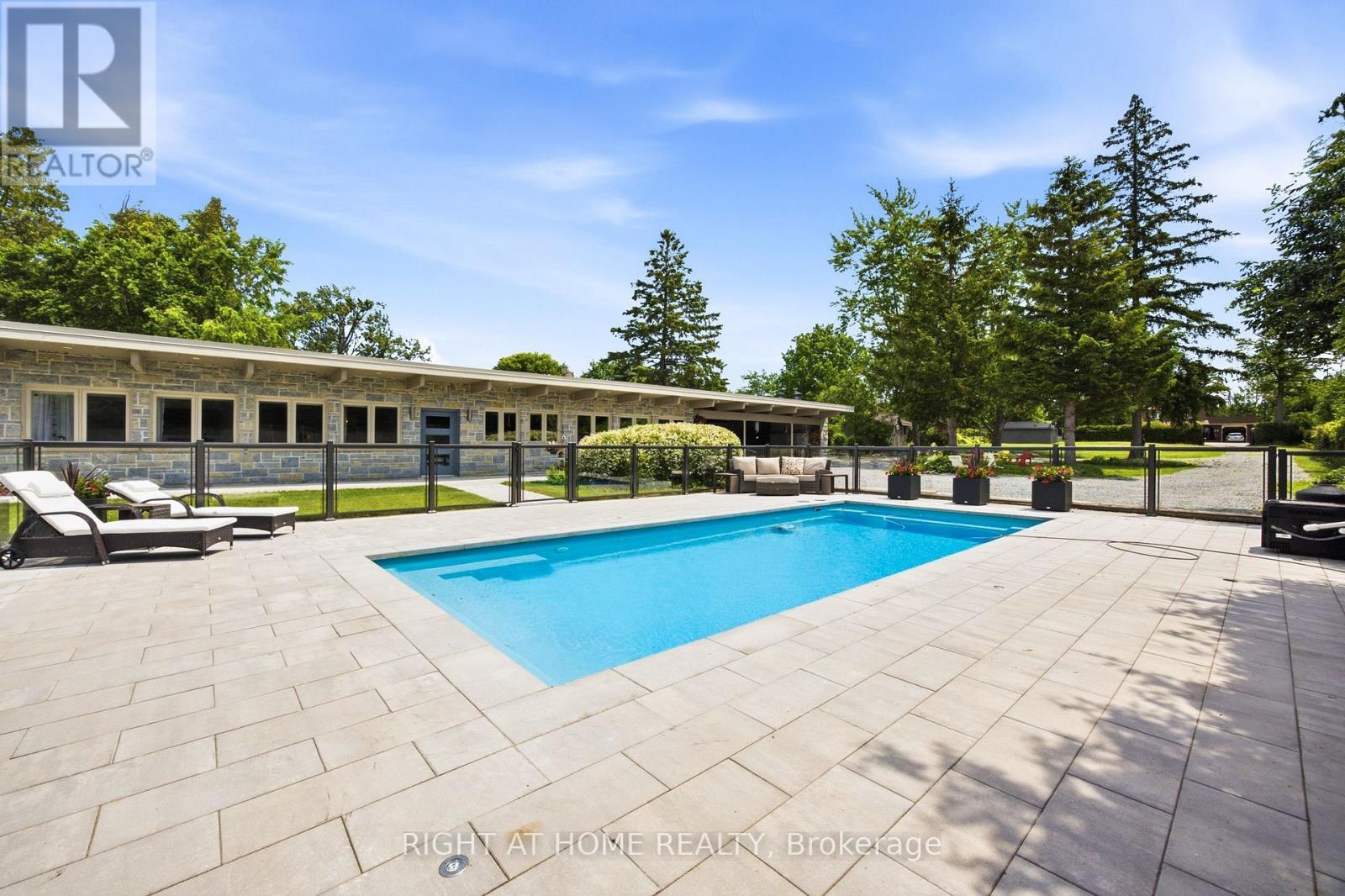 25260 Maple Beach Road, Brock, ON - Outdoor With In Ground Pool