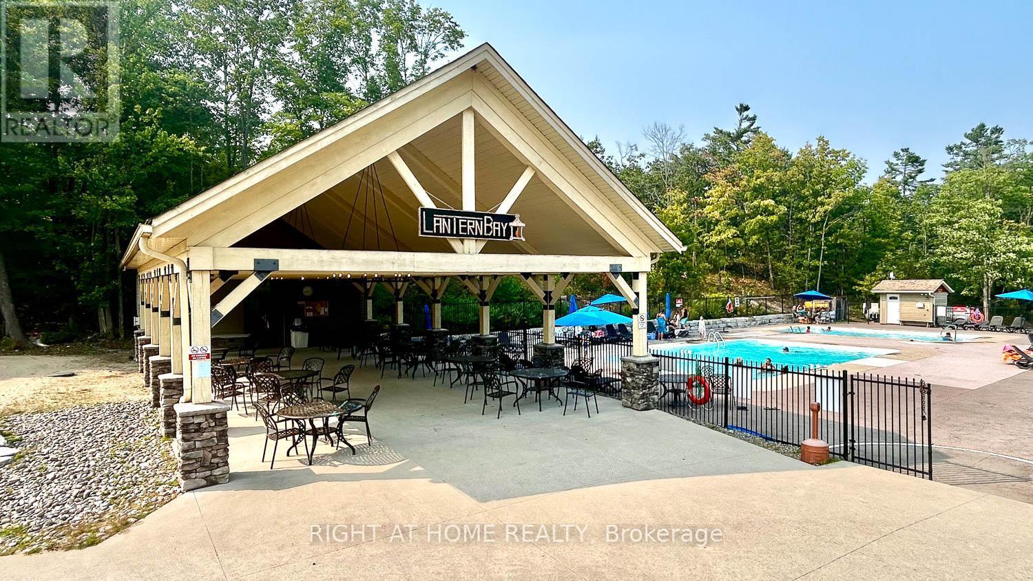 29 Maple Ridge - 1336 South Morrison Lake Road, Gravenhurst, ON - Outdoor With In Ground Pool With Deck Patio Veranda