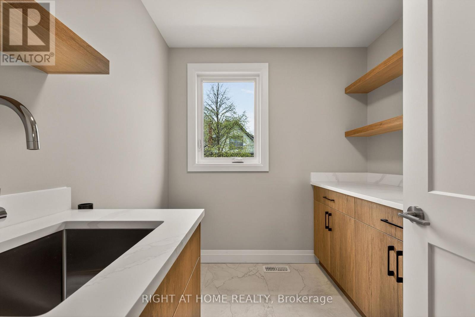 2nd Floor laundry room close to bedrooms - 279 Hess Street S, Hamilton, ON - Indoor Photo Showing Kitchen