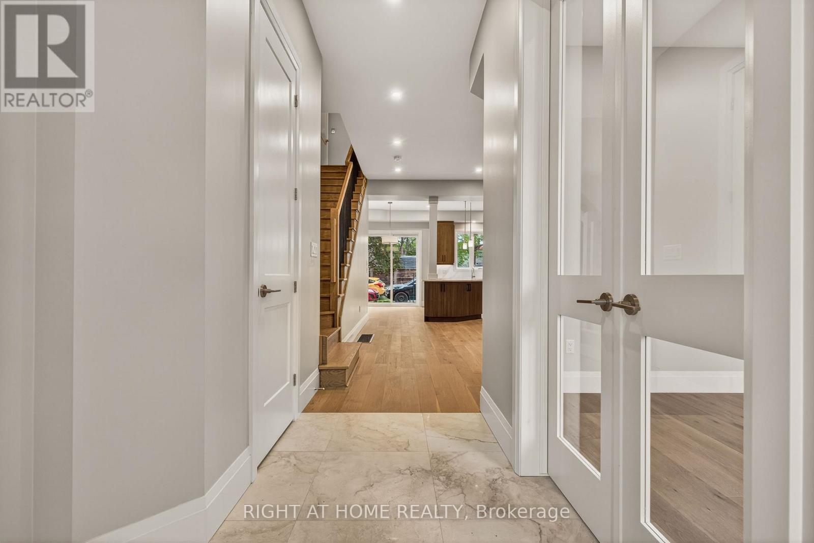 Entry way with 2 piece bath and front closet - 279 Hess Street S, Hamilton, ON - Indoor Photo Showing Other Room