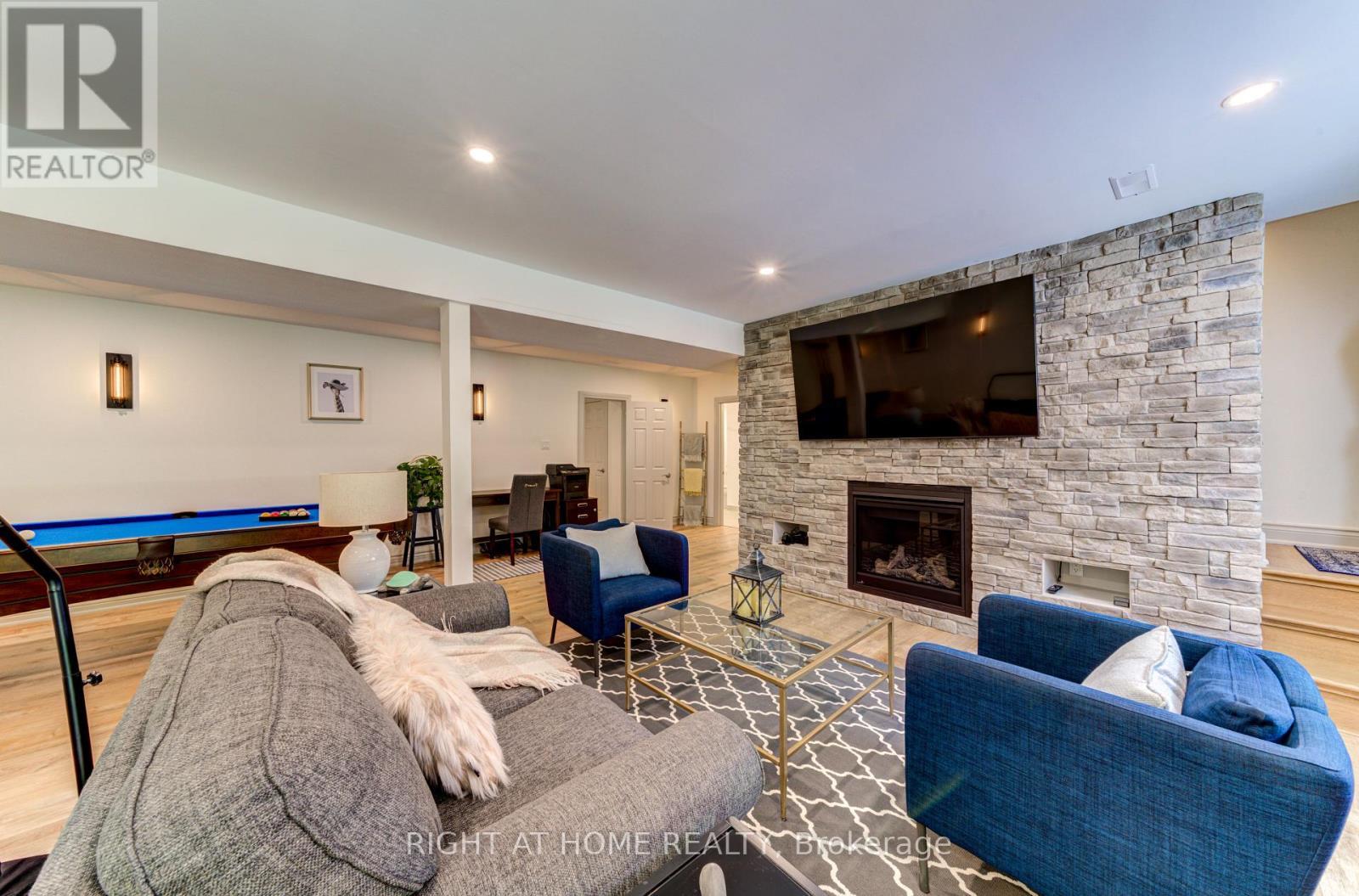 214 Desroches Trail, Tiny, ON - Indoor With Fireplace