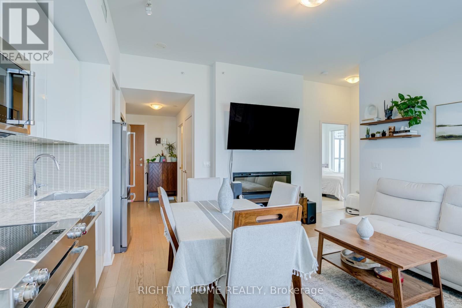 1413 - 30 Shore Breeze Drive, Toronto, ON - Indoor With Fireplace
