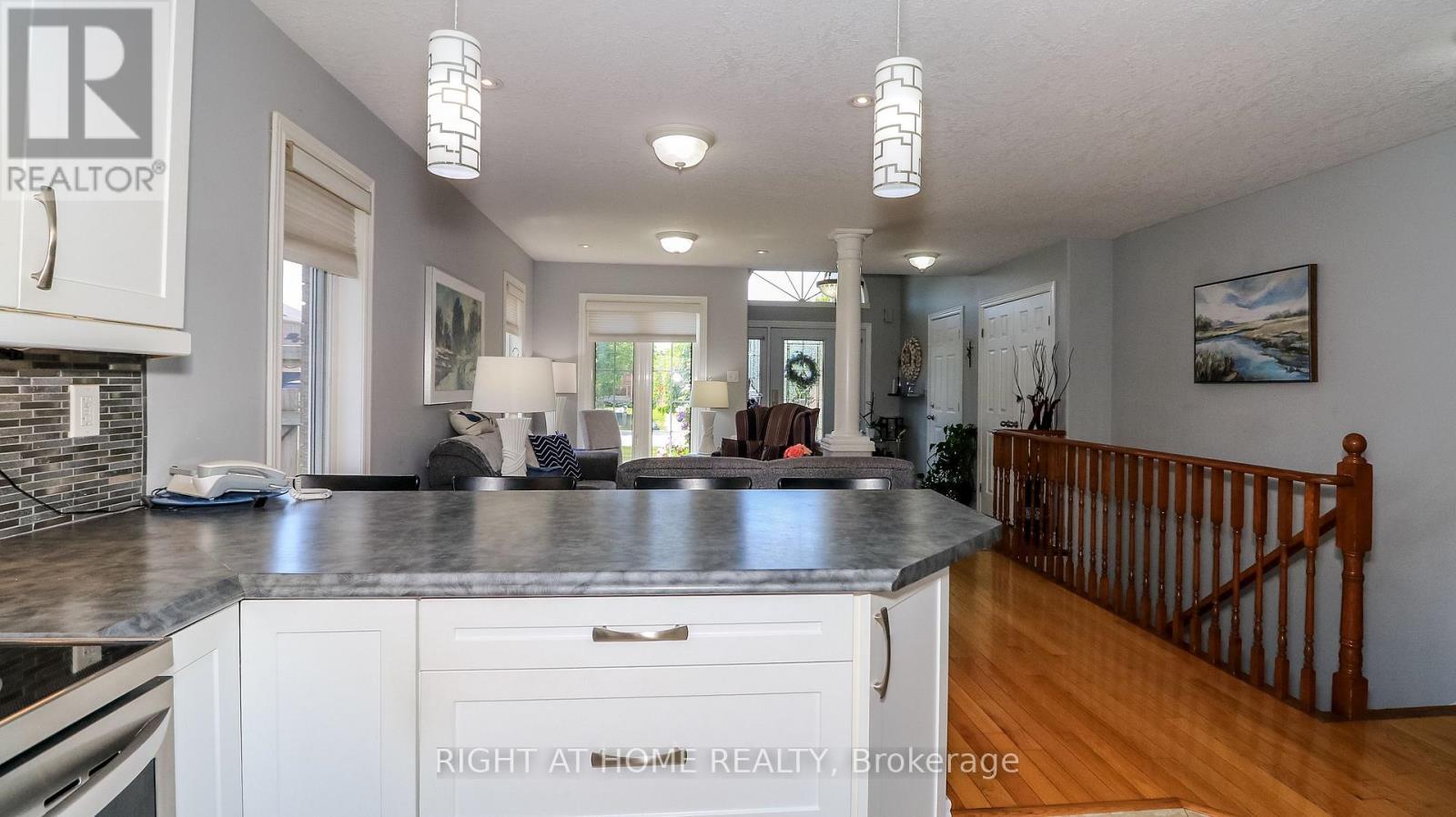Lots of pot lights and upgraded lighting - 36 Benjamin Lane, Barrie, ON - Indoor Photo Showing Other Room