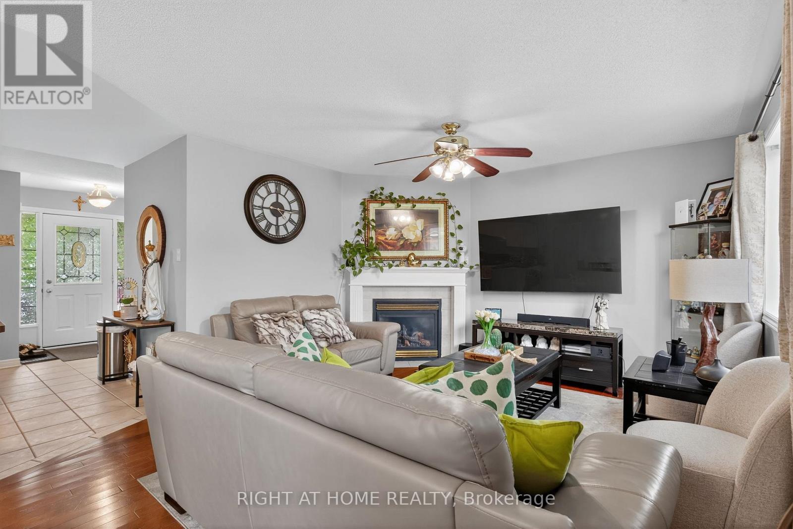 3 Player Drive, Barrie, ON - Indoor Photo Showing Living Room With Fireplace