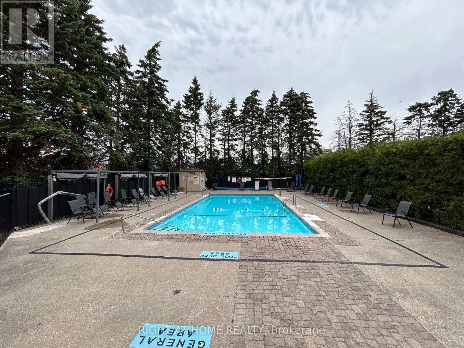 201 - 7460 Bathurst, Vaughan, ON - Outdoor With In Ground Pool
