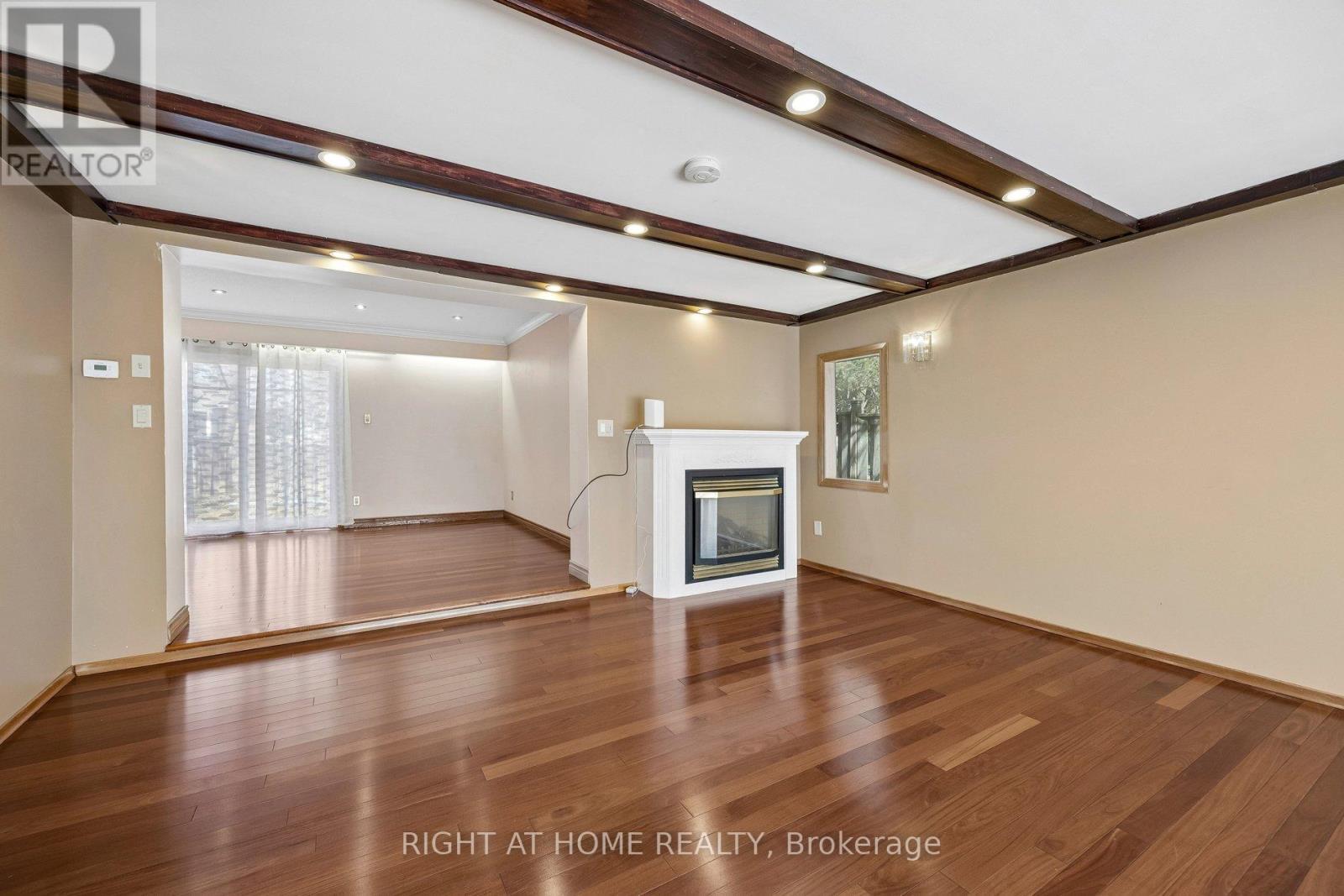 46 Tidefall Drive, Toronto, ON - Indoor Photo Showing Other Room With Fireplace