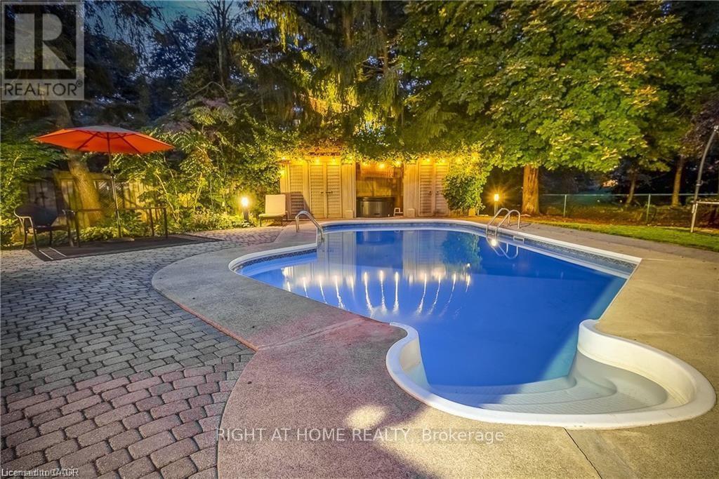 3021 Lakeshore Road, Burlington, ON - Outdoor With In Ground Pool With Backyard