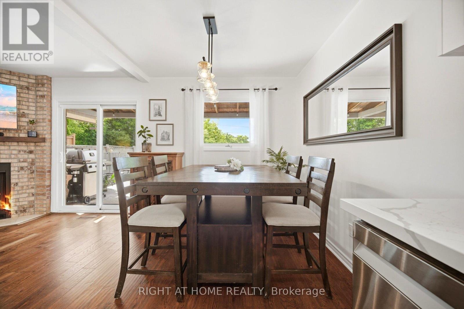 7013 Hickling Crescent, Mississauga, ON - Indoor Photo Showing Dining Room With Fireplace