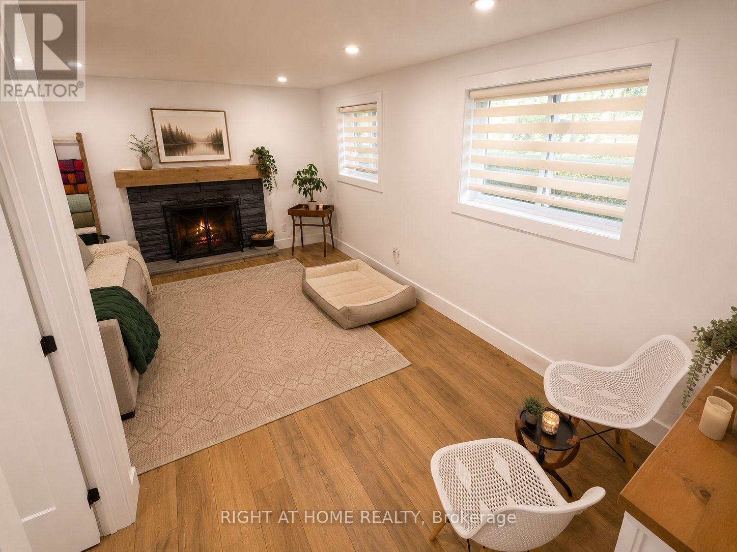 4440 Cosburn Crescent, Burlington, ON - Indoor With Fireplace