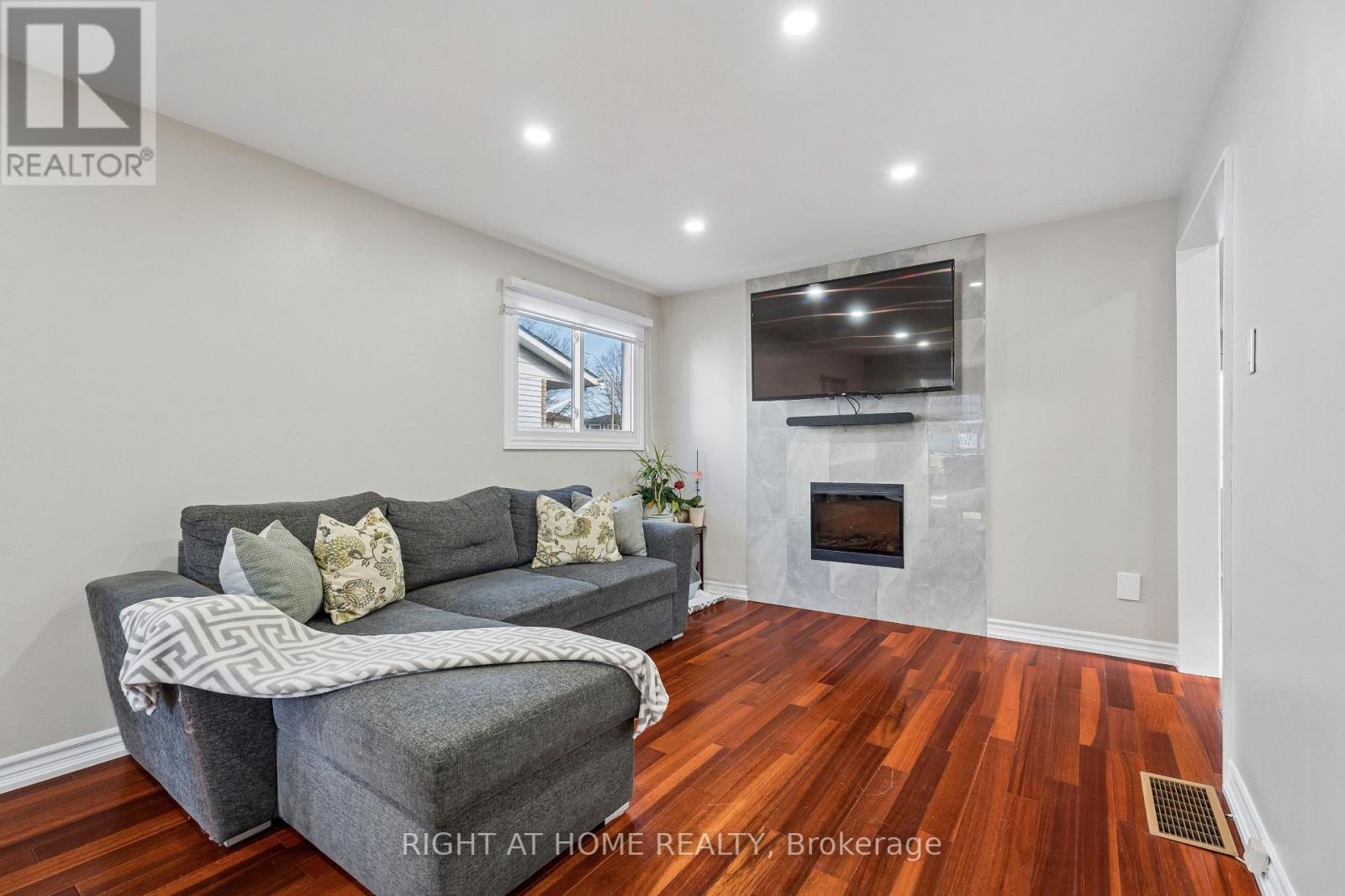 56 Hemingway Crescent, Barrie, ON - Indoor Photo Showing Living Room With Fireplace