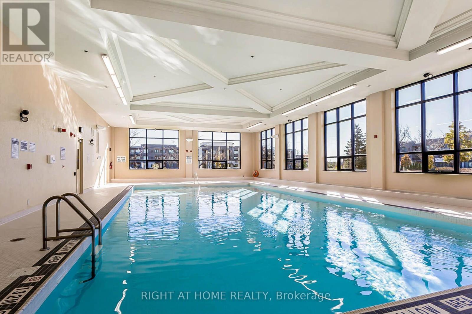318 - 40 Via Rosedale, Brampton, ON - Indoor Photo Showing Other Room With In Ground Pool
