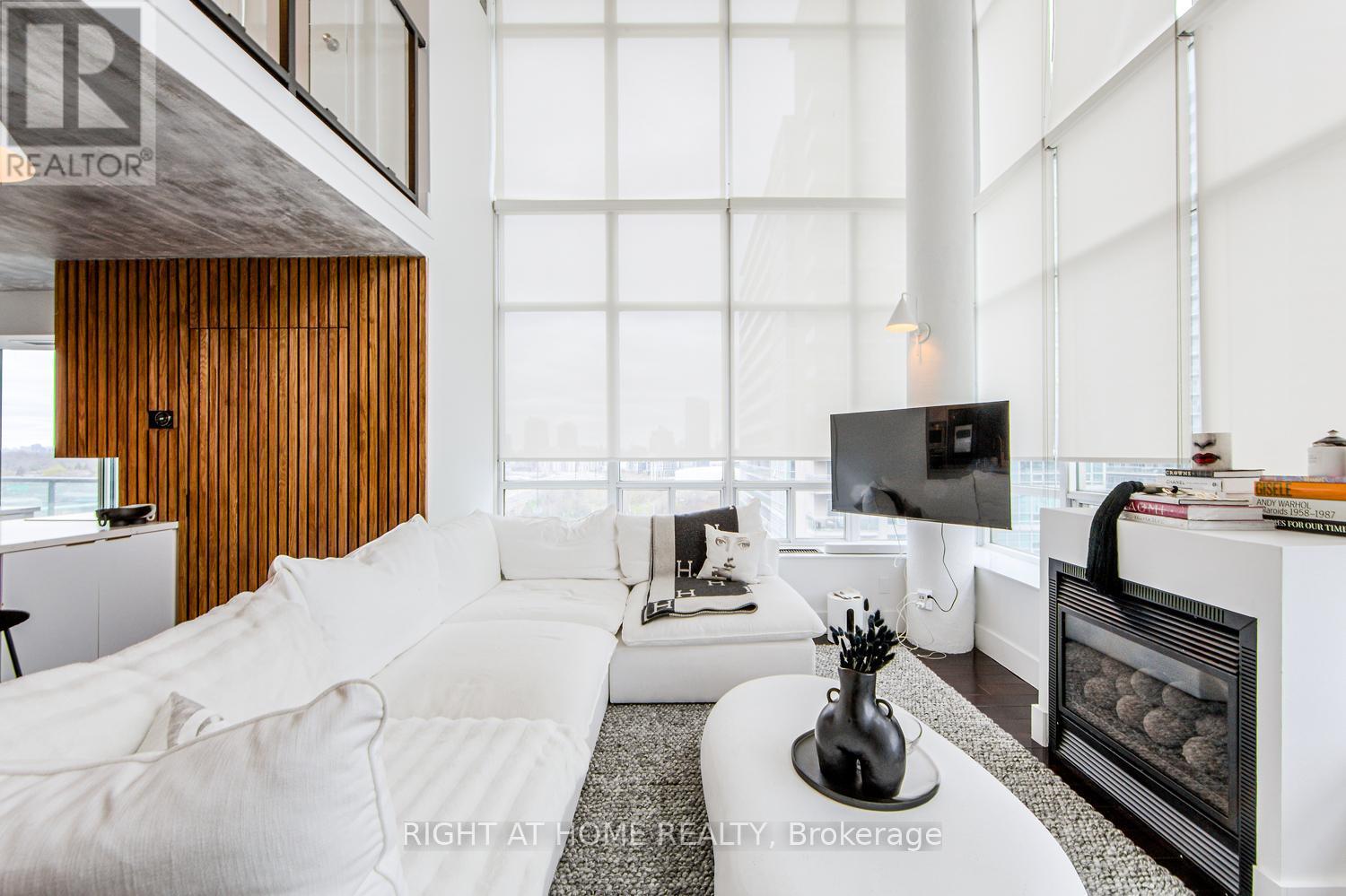 728 - 250 Manitoba Street Se, Toronto, ON - Indoor With Fireplace